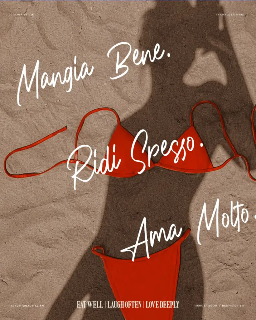 Shadow of a woman over a red bikini on the sand with the words Mangia bene, ridi spesso, ama molto